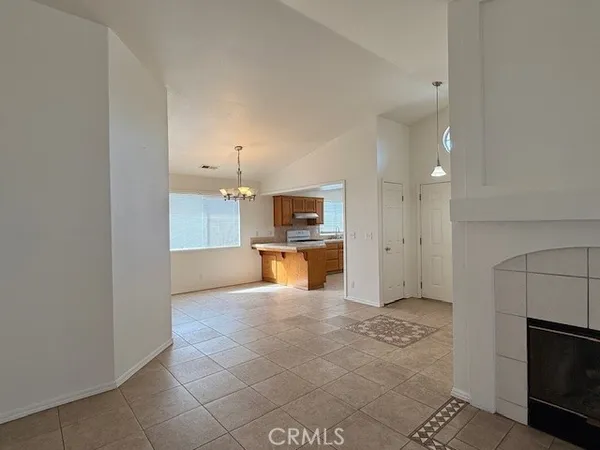 a view of a kitchen with a sink