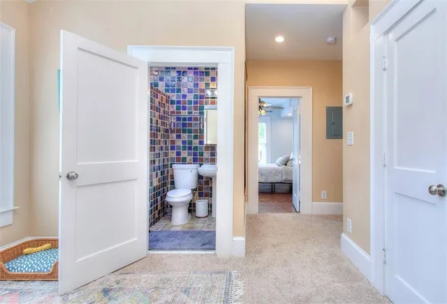 a bathroom with a glass door shower