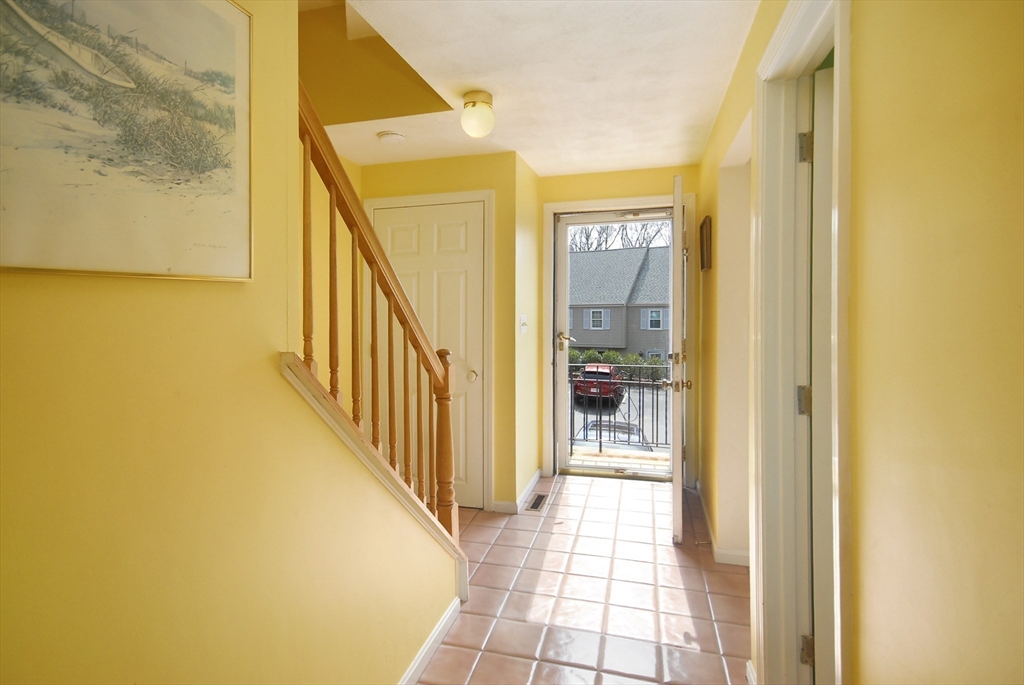 12 Oak Ridge Drive, Unit 4 Maynard, MA 01754 - Photo 11 of 36 a view of a hallway with wooden floor and staircase