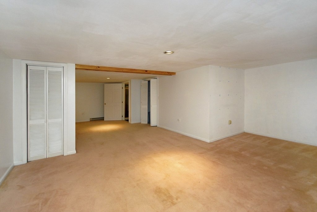 12 Oak Ridge Drive, Unit 4 Maynard, MA 01754 - Photo 23 of 36 a view of empty room