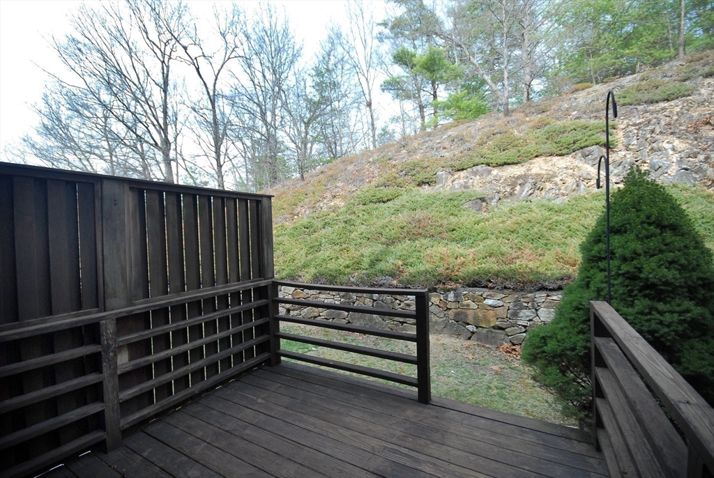 12 Oak Ridge Drive, Unit 4 Maynard, MA 01754 - Photo 27 of 36 a view of a wooden deck