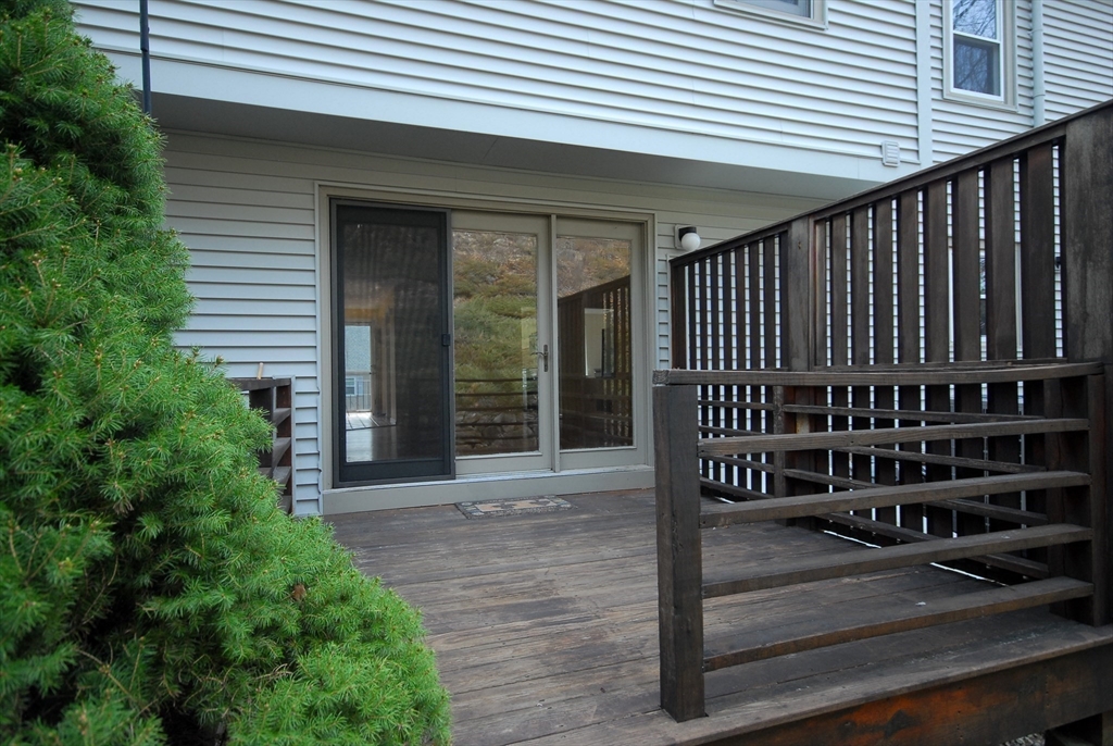 12 Oak Ridge Drive, Unit 4 Maynard, MA 01754 - Photo 28 of 36 a front view of a house with a porch