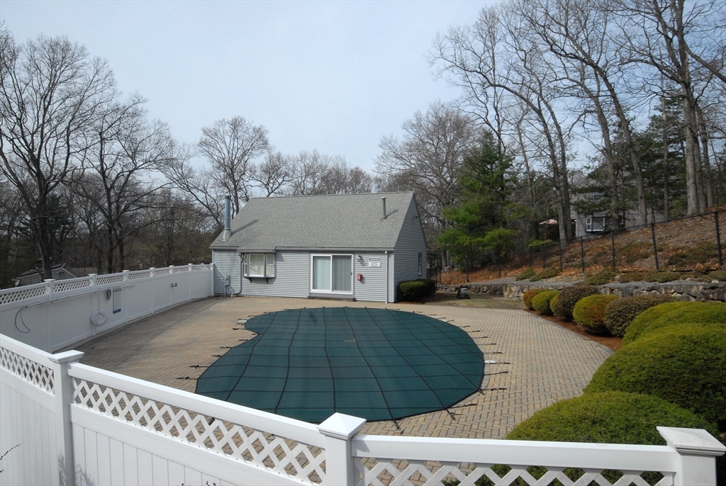 12 Oak Ridge Drive, Unit 4 Maynard, MA 01754 - Photo 34 of 36 a view of a house with a yard