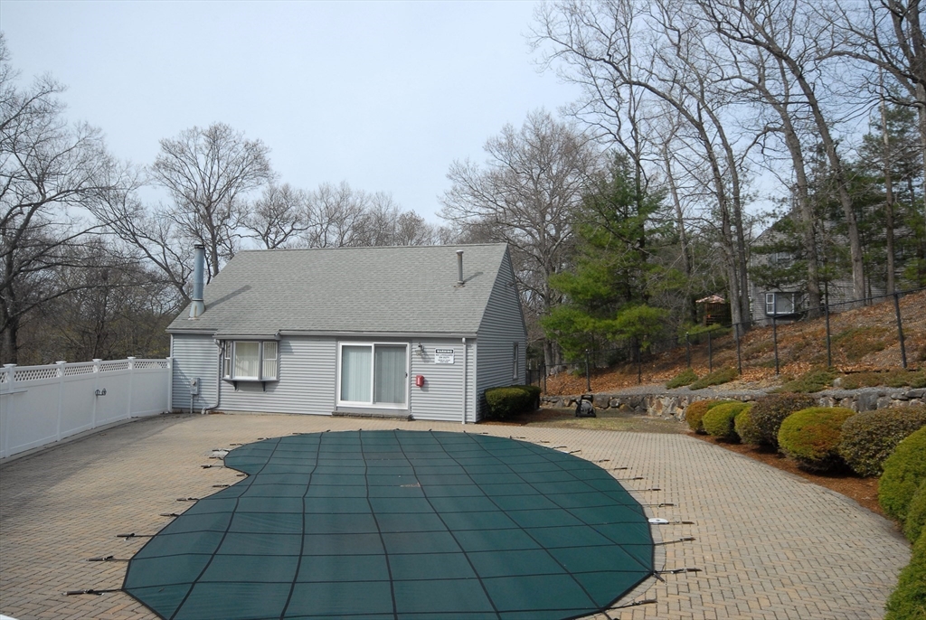 12 Oak Ridge Drive, Unit 4 Maynard, MA 01754 - Photo 35 of 36 a view of a house with a yard
