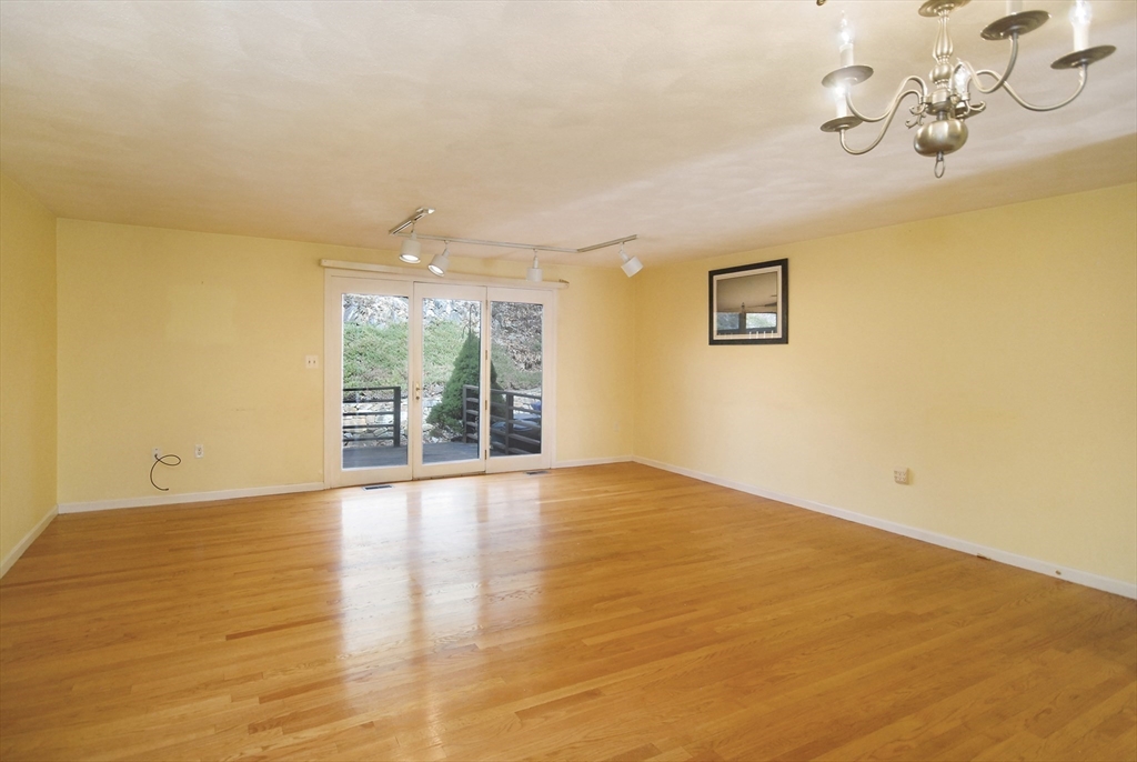 12 Oak Ridge Drive, Unit 4 Maynard, MA 01754 - Photo 7 of 36 a view of an empty room with a window