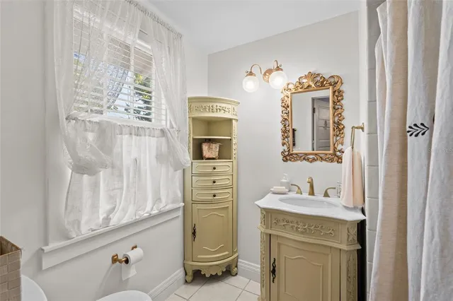 a view of a house with a yard and plants