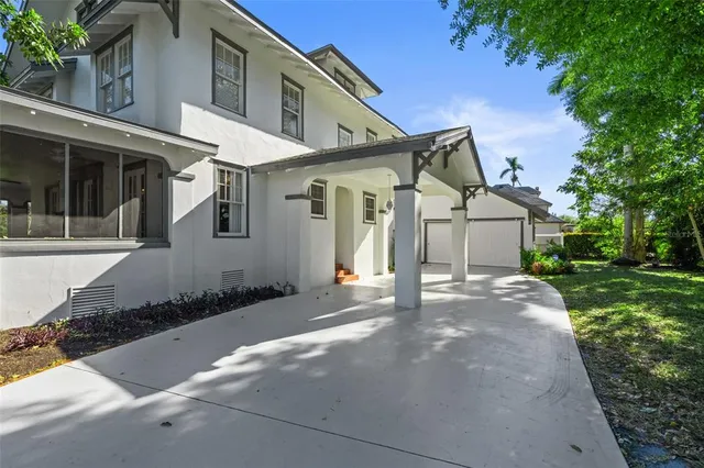 a living room with furniture and windows