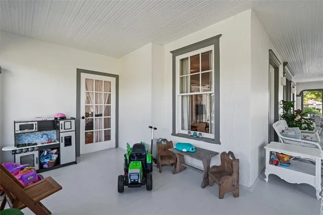 a view of a livingroom with furniture window and outside view