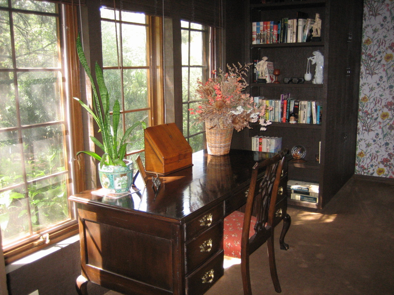 1117 Foothill Road Ojai, CA 93023 - Photo 5 of 15 a living room with furniture and a potted plant