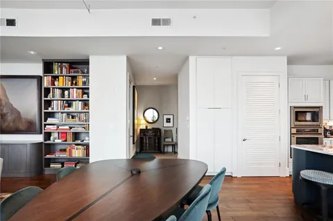 a view of a workspace with furniture