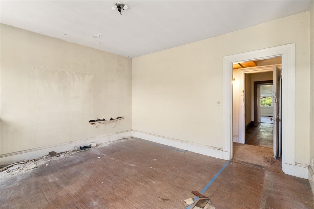 1495 Beacon Street, Unit 3 Brookline, MA 02446 - Photo 16 of 27 a view of a room with an empty space