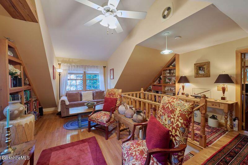 2232 Jacobs Ladder Road Becket, MA 01223 - Photo 27 of 44 a living room with furniture and wooden floor