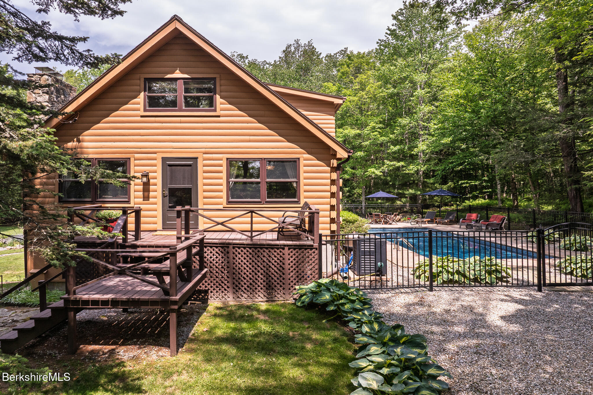 2232 Jacobs Ladder Road Becket, MA 01223 - Photo 6 of 44 a view of a house with backyard and sitting area