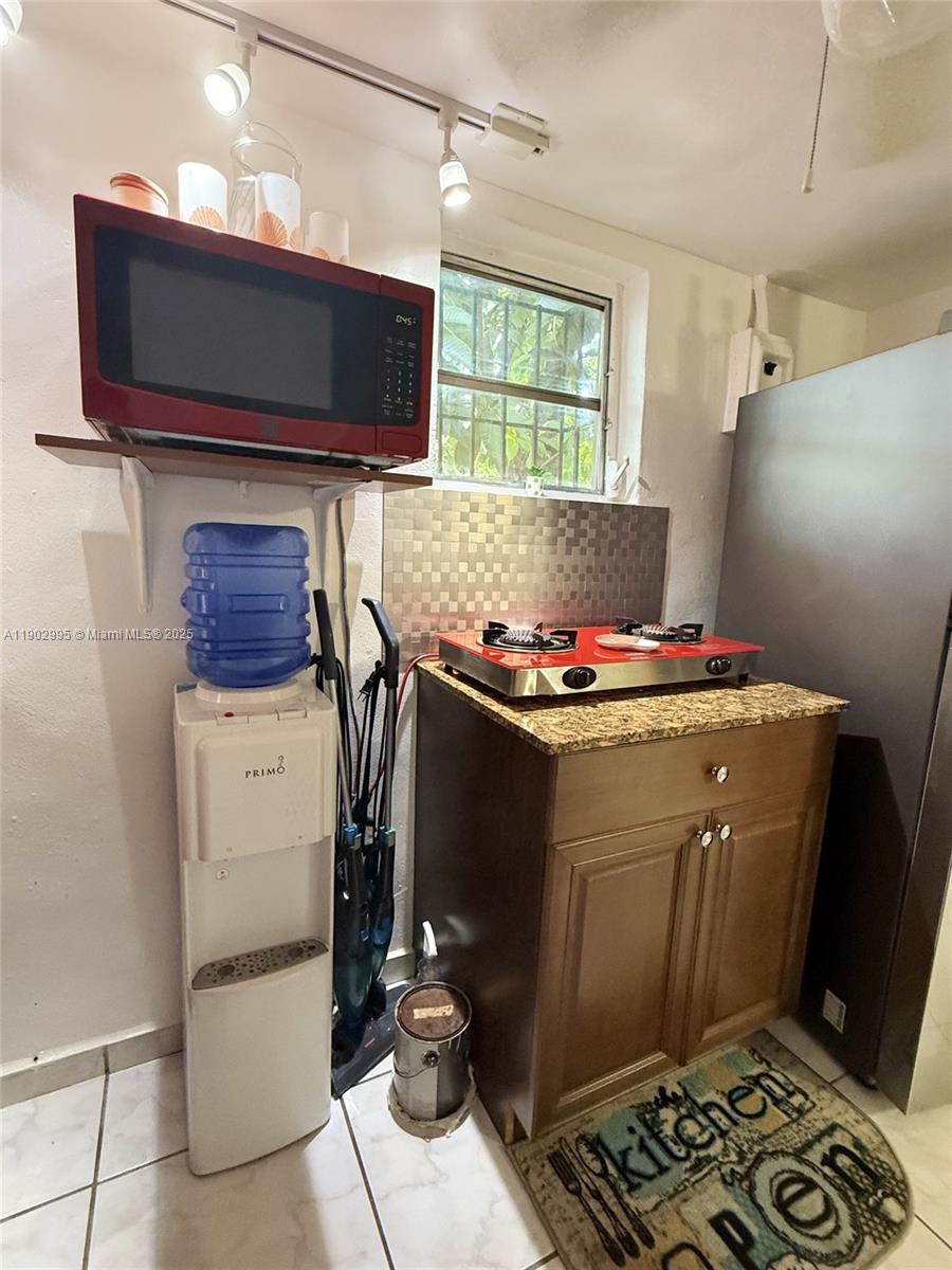 1835 Southwest 10th Street Miami, FL 33135 - Photo 40 of 50 a room with storage and utility