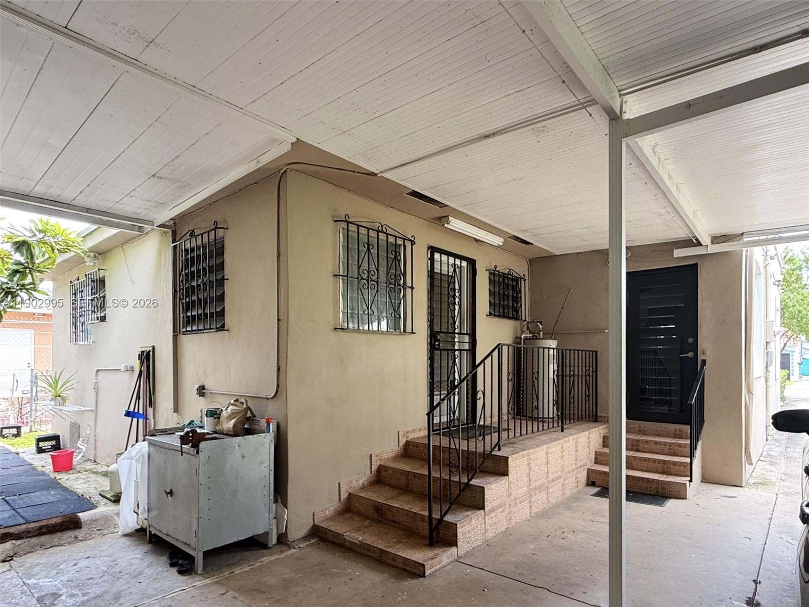 1835 Southwest 10th Street Miami, FL 33135 - Photo 6 of 51 Rear and In-Laws Quarter Entry View