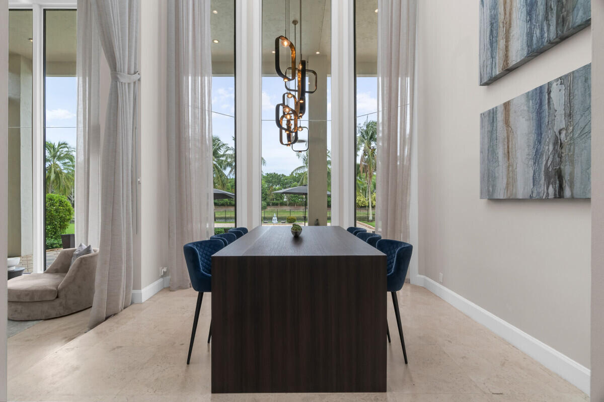 3500 Windmill Ranch Road Weston, FL 33331 - Photo 13 of 47 a dining room with furniture and a window