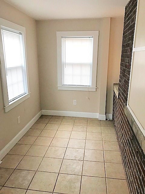 45 Water Street, Unit 2 Quincy, MA 02169 - Photo 13 of 14 a view of an empty room with a window