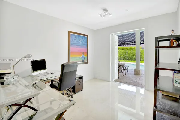 a view of a workspace with furniture and a livingroom