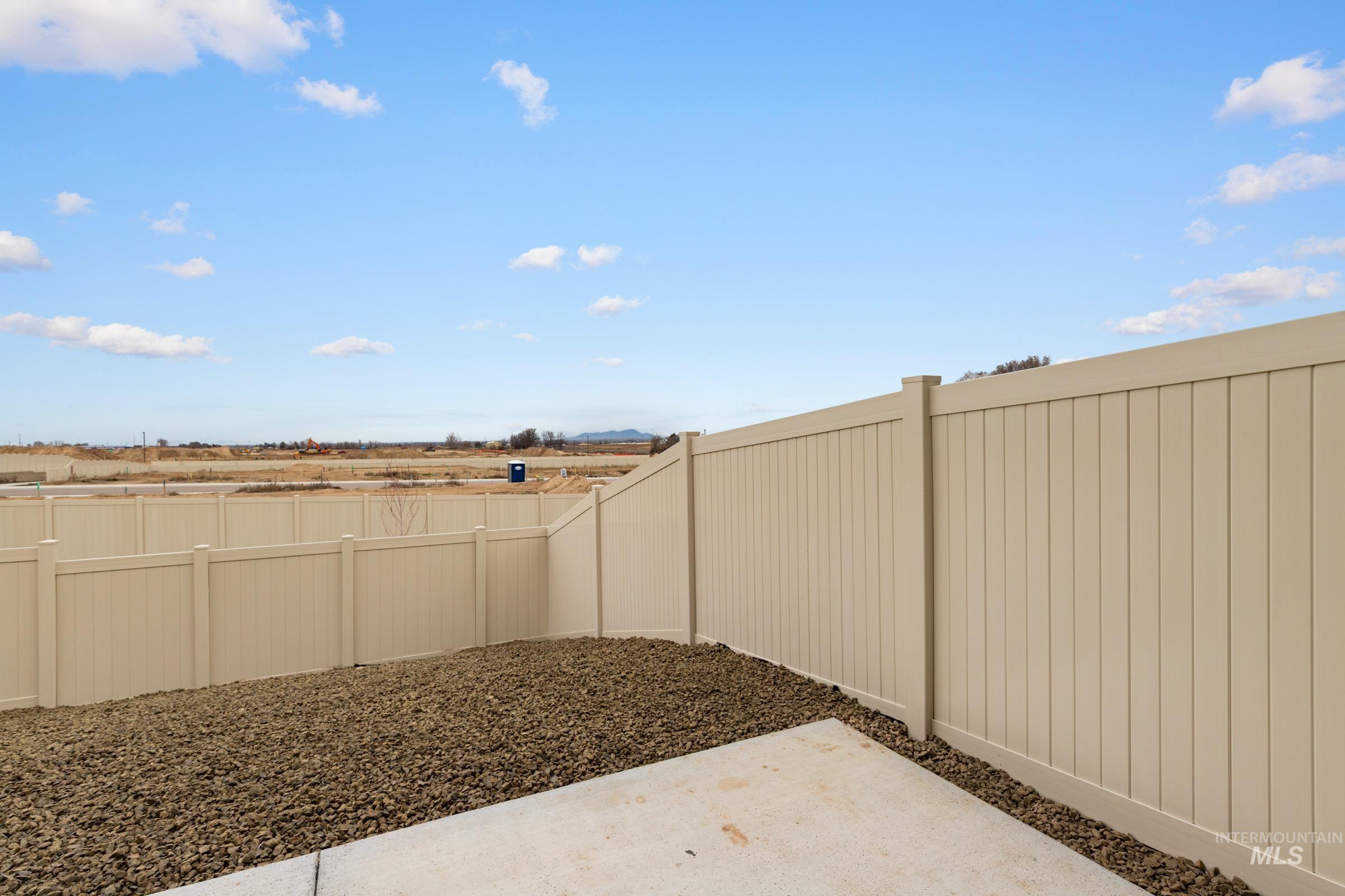 10824 Rutland Street Caldwell, ID 83605 - Photo 18 of 20 Fenced backyard featuring a patio area