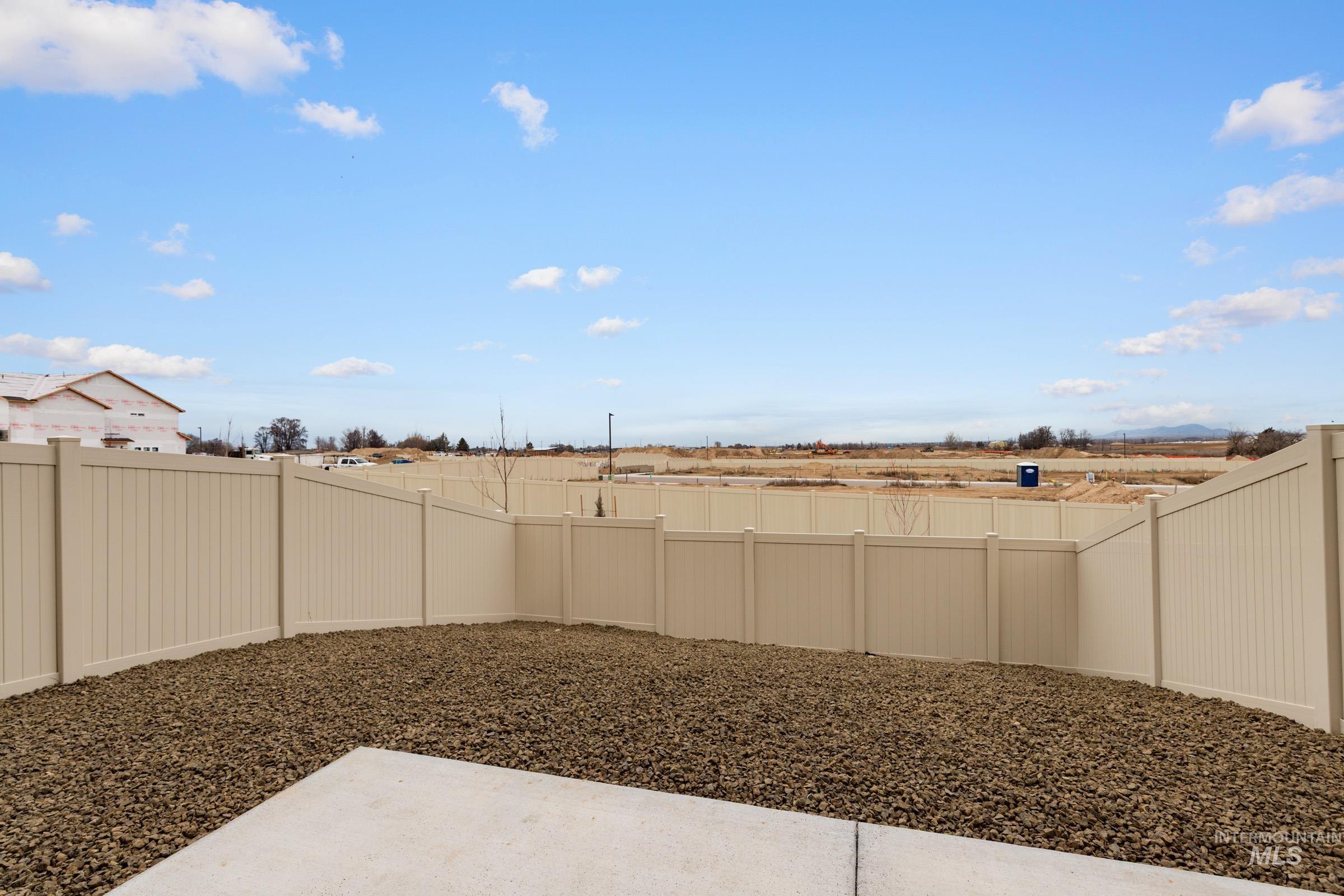 10824 Rutland Street Caldwell, ID 83605 - Photo 19 of 20 Fenced backyard with a patio area