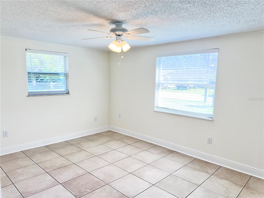 5701 Quist Drive Port Richey, FL 34668 - Photo 11 of 53 a view of an empty room with a window