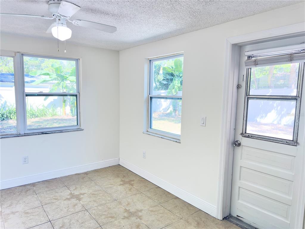 5701 Quist Drive Port Richey, FL 34668 - Photo 33 of 53 a view of an empty room with a window