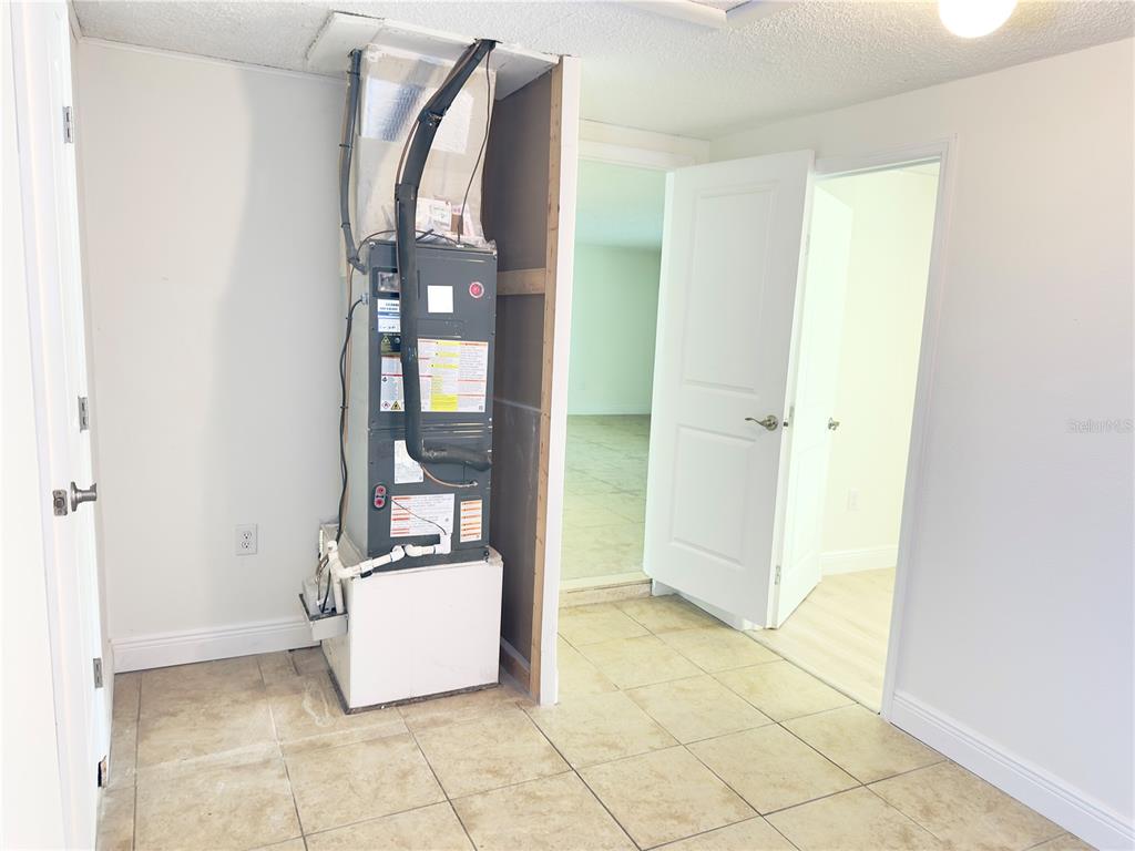 5701 Quist Drive Port Richey, FL 34668 - Photo 39 of 53 a view of a hallway with seating area