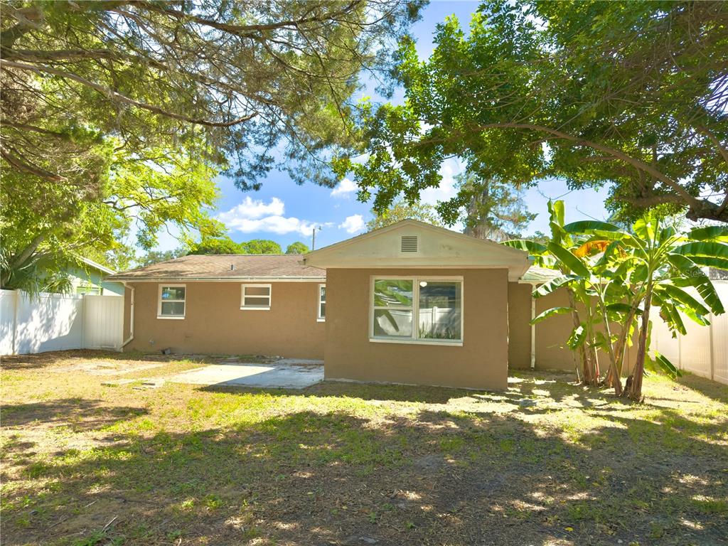 5701 Quist Drive Port Richey, FL 34668 - Photo 45 of 53 a view of a house with a yard