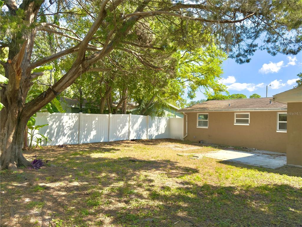 5701 Quist Drive Port Richey, FL 34668 - Photo 53 of 53 a view of a house with a yard