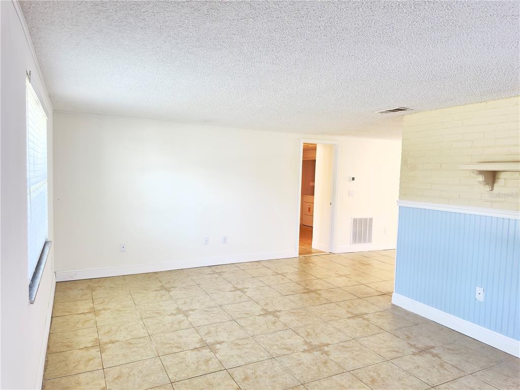 5701 Quist Drive Port Richey, FL 34668 - Photo 10 of 53 a view of an empty room