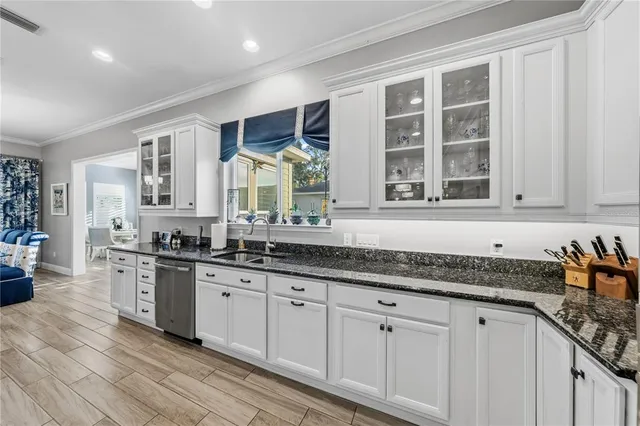 a potted plant sitting in front of a house