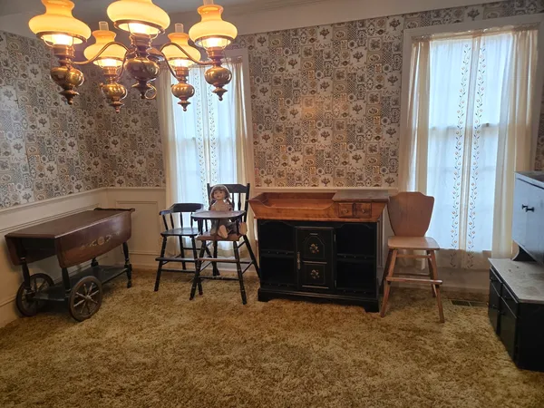 a bedroom with a bed and a cabinets