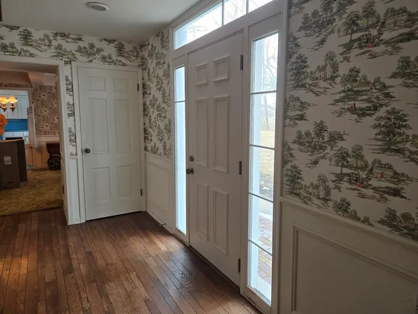 a view of balcony with wooden floor