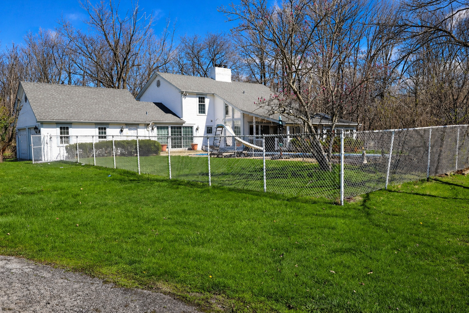 1663 East Rietveld Drive Crete, IL 60417 - Photo 64 of 64 a view of a house with backyard and a tree