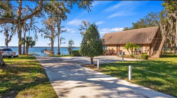 a view of a yard with an outdoor space