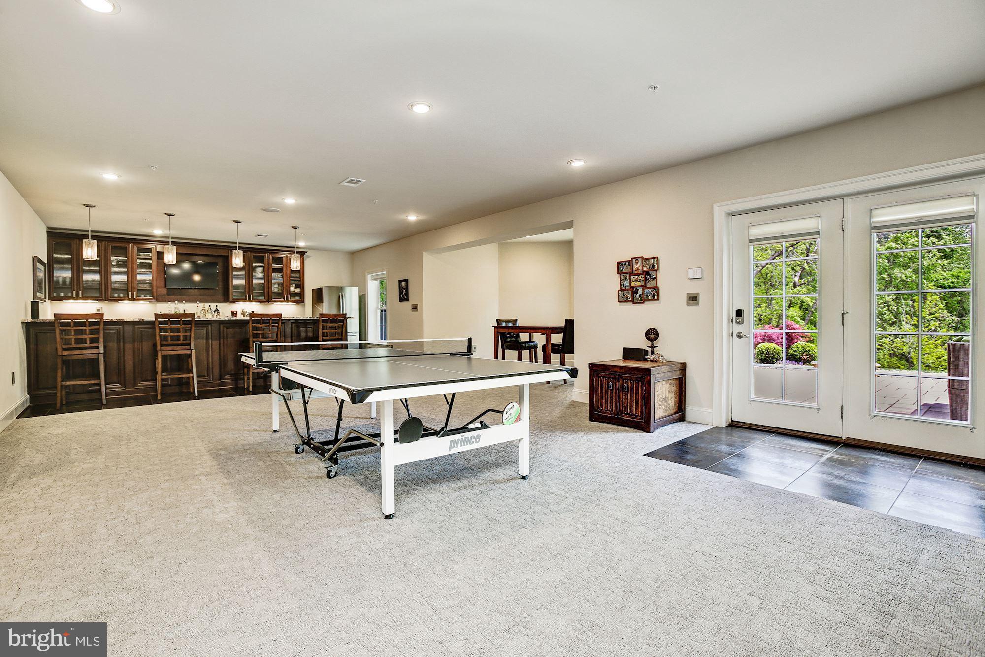 13029 Highgrove Road Highland, MD 20777 - Photo 35 of 71 Game Area & Walk-out to Patio
