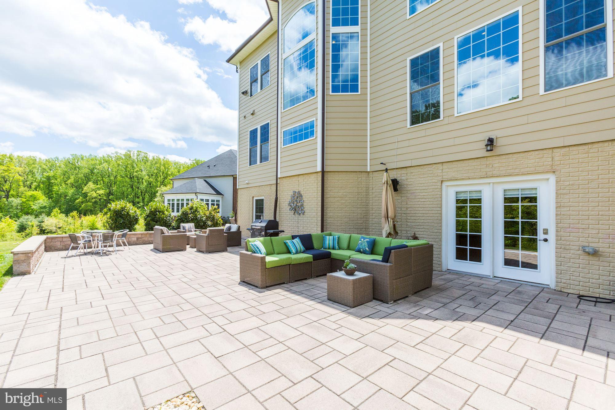 13029 Highgrove Road Highland, MD 20777 - Photo 36 of 71 Expansive Paver Patio & Walk-out