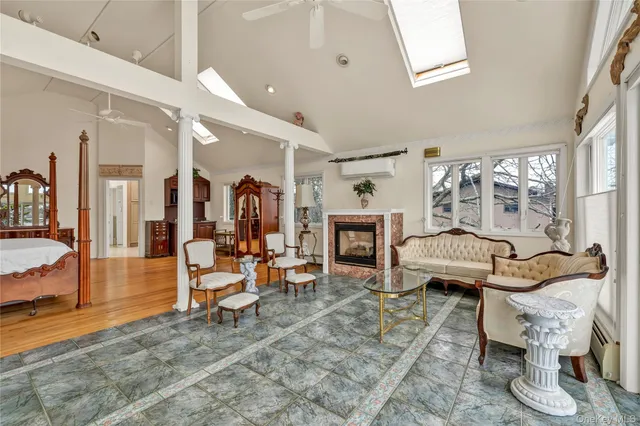 a living room with furniture and a table