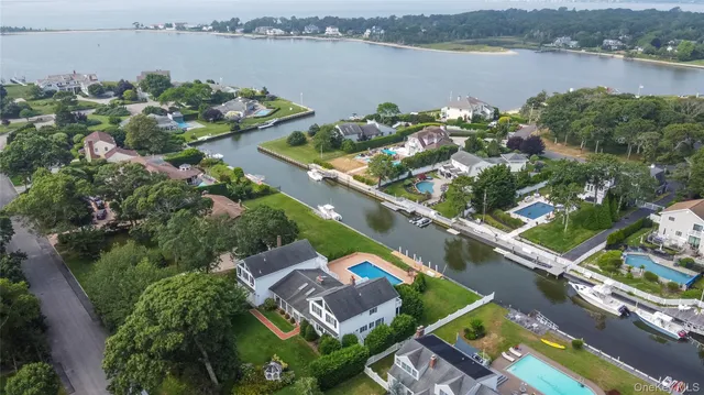 an aerial view of a city with lake view