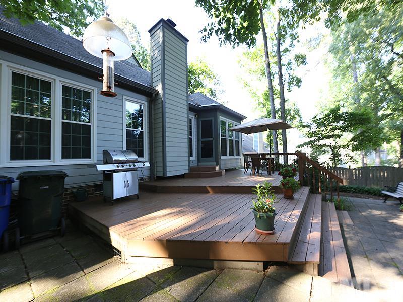 8121 Coleraine Court Raleigh, NC 27615 - Photo 14 of 17 a view of a house with backyard porch and sitting area