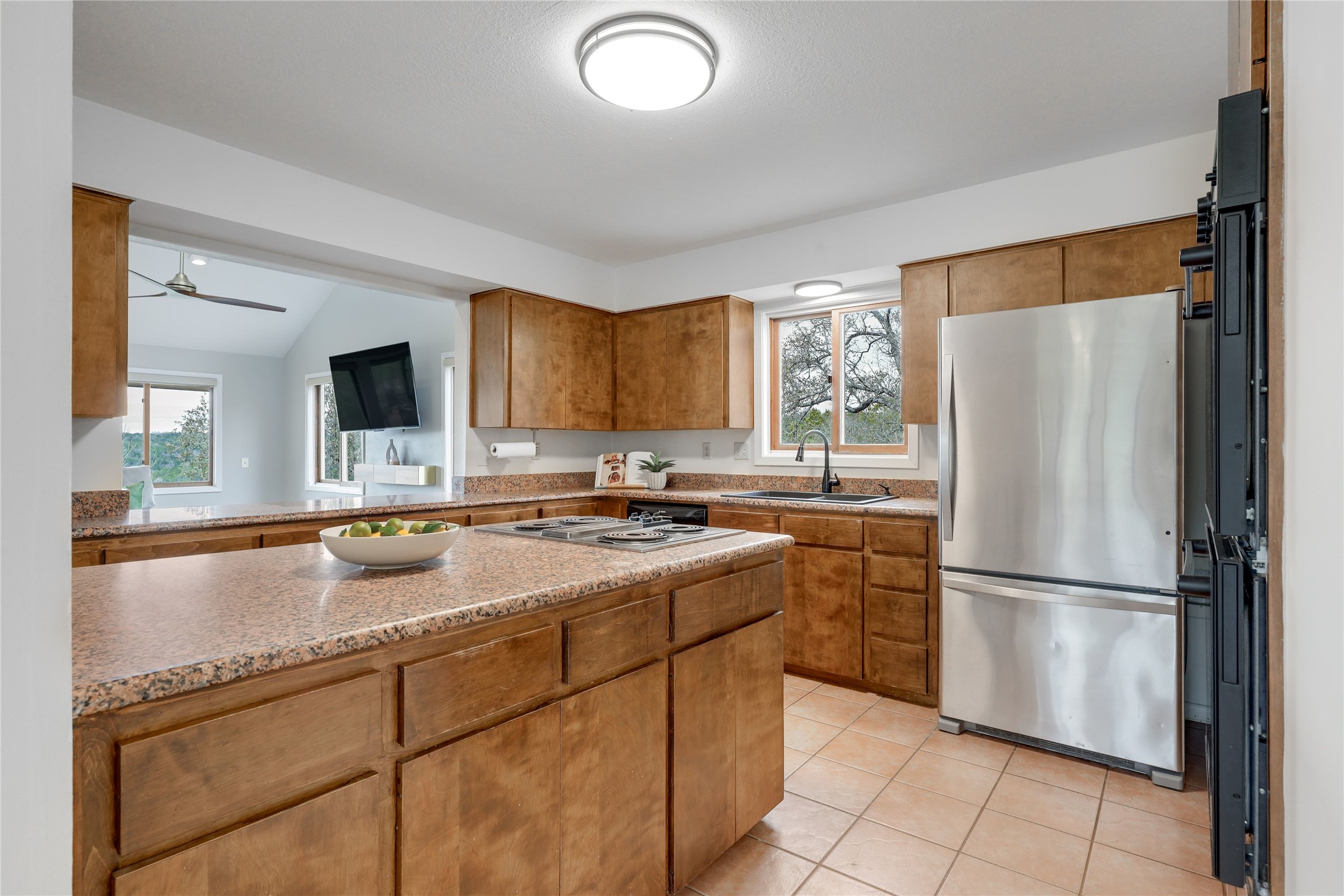18205 Ridge Road Lago Vista, TX 78645 - Photo 14 of 31 kitchen with pass through to living room