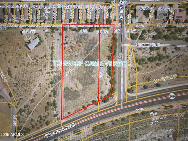 a view of a balcony with wooden floor and city view