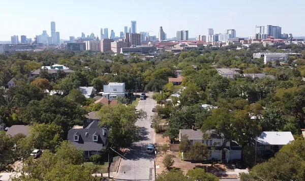 a view of a city with tall buildings