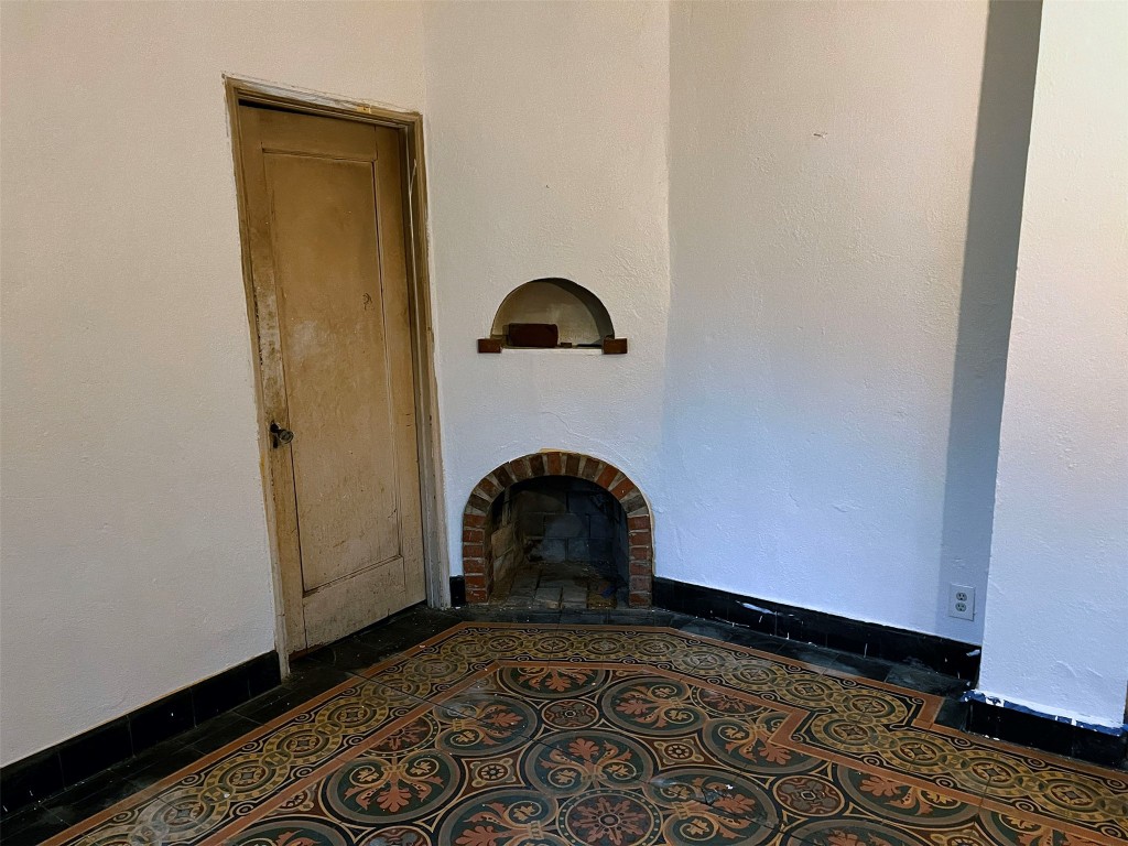 3506 Tom Green Street, Unit 1 Austin, TX 78705 - Photo 12 of 15 a room with a wooden floor and a window