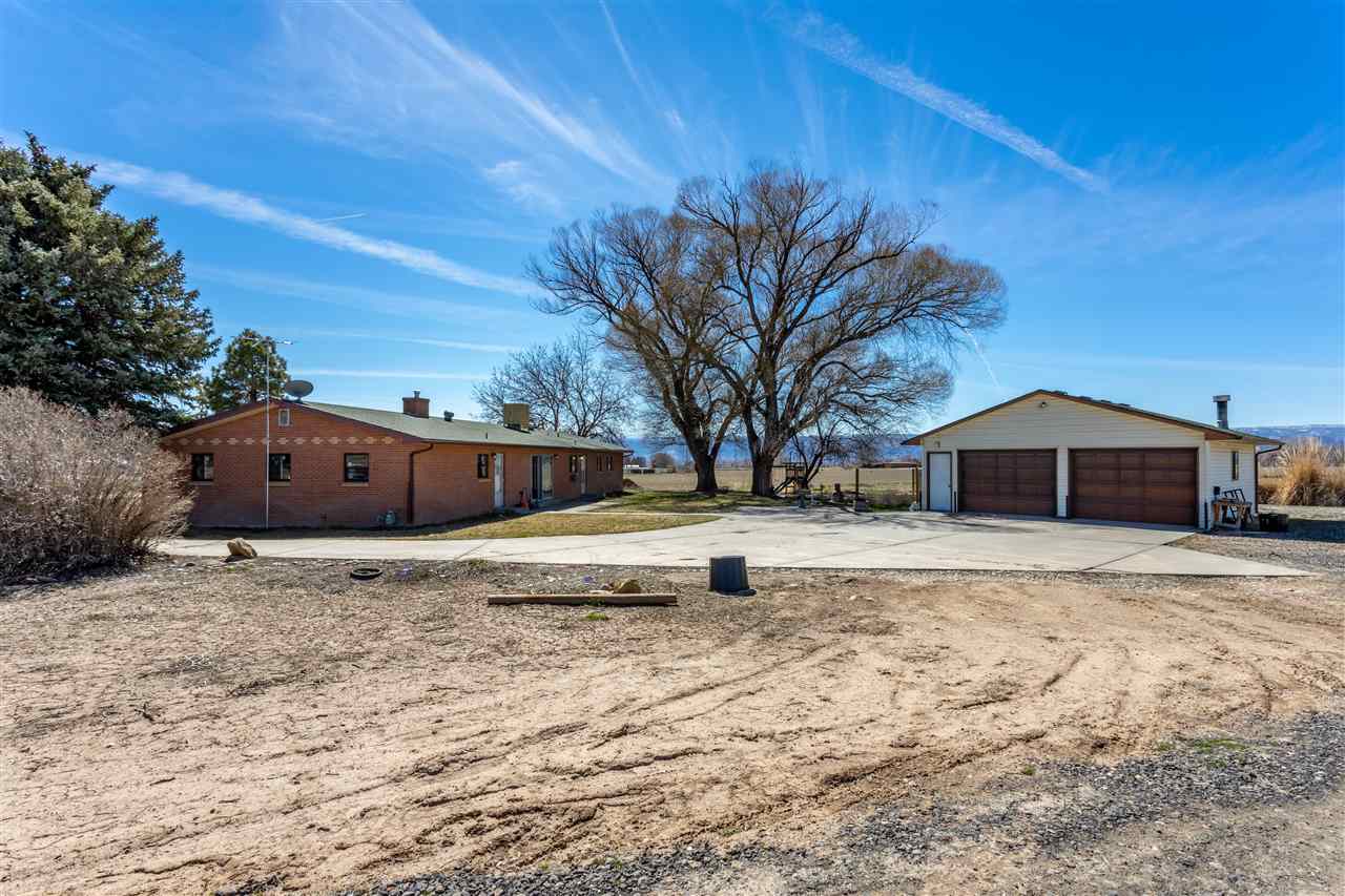 1127 23 Road Grand Junction, CO 81505 - Photo 2 of 20 a view of a house with a yard