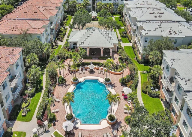 an aerial view of a house with a garden