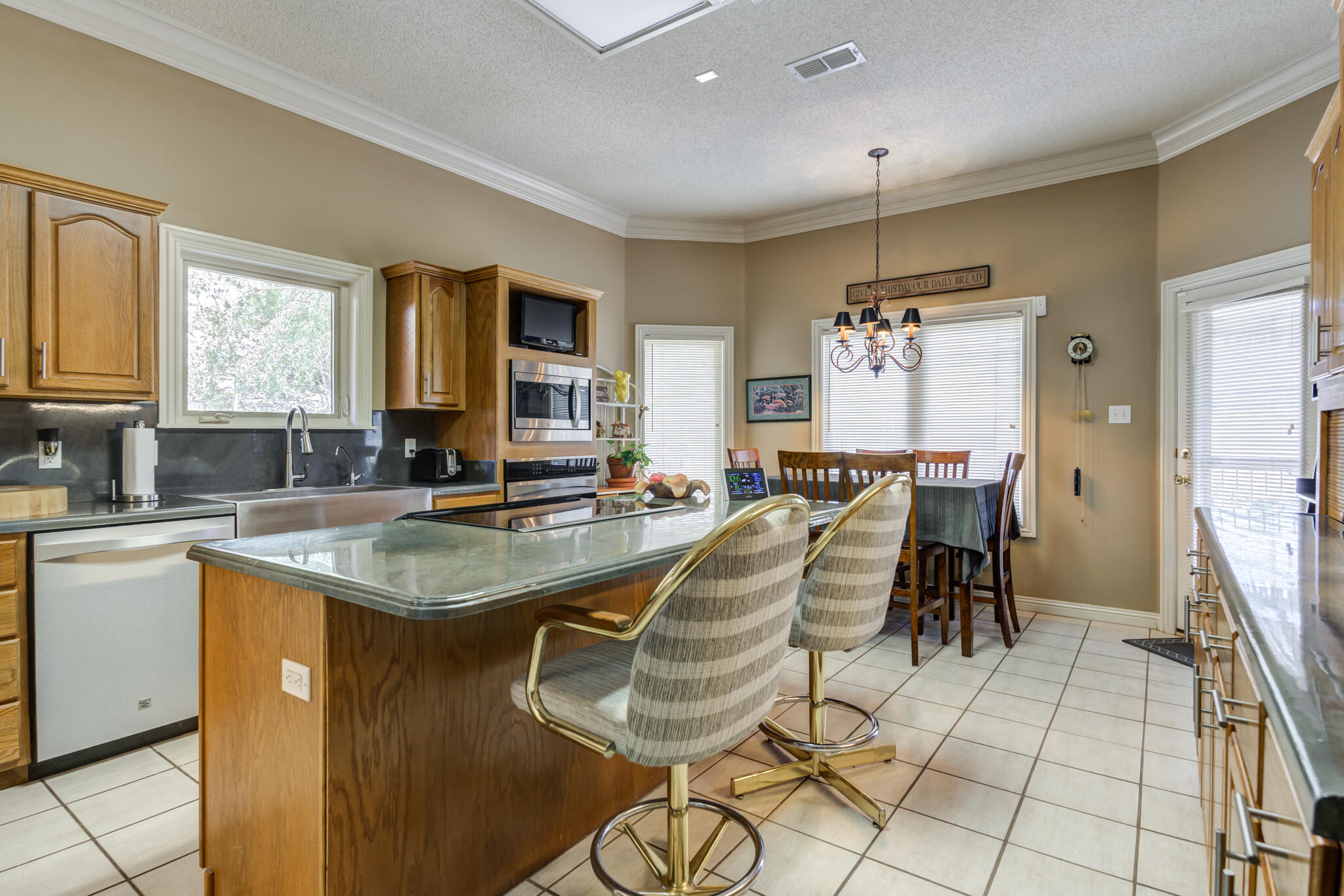 30 West Lakeshore Drive Ransom Canyon, TX 79366 - Photo 14 of 58 a living room with granite countertop furniture a dining table and chairs