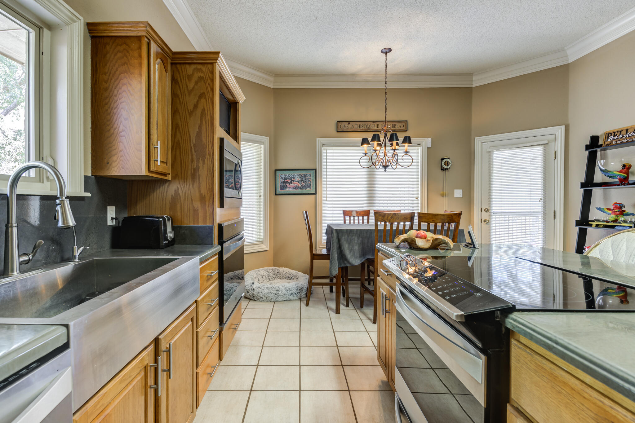 30 West Lakeshore Drive Ransom Canyon, TX 79366 - Photo 16 of 58 a kitchen with a refrigerator and a sink