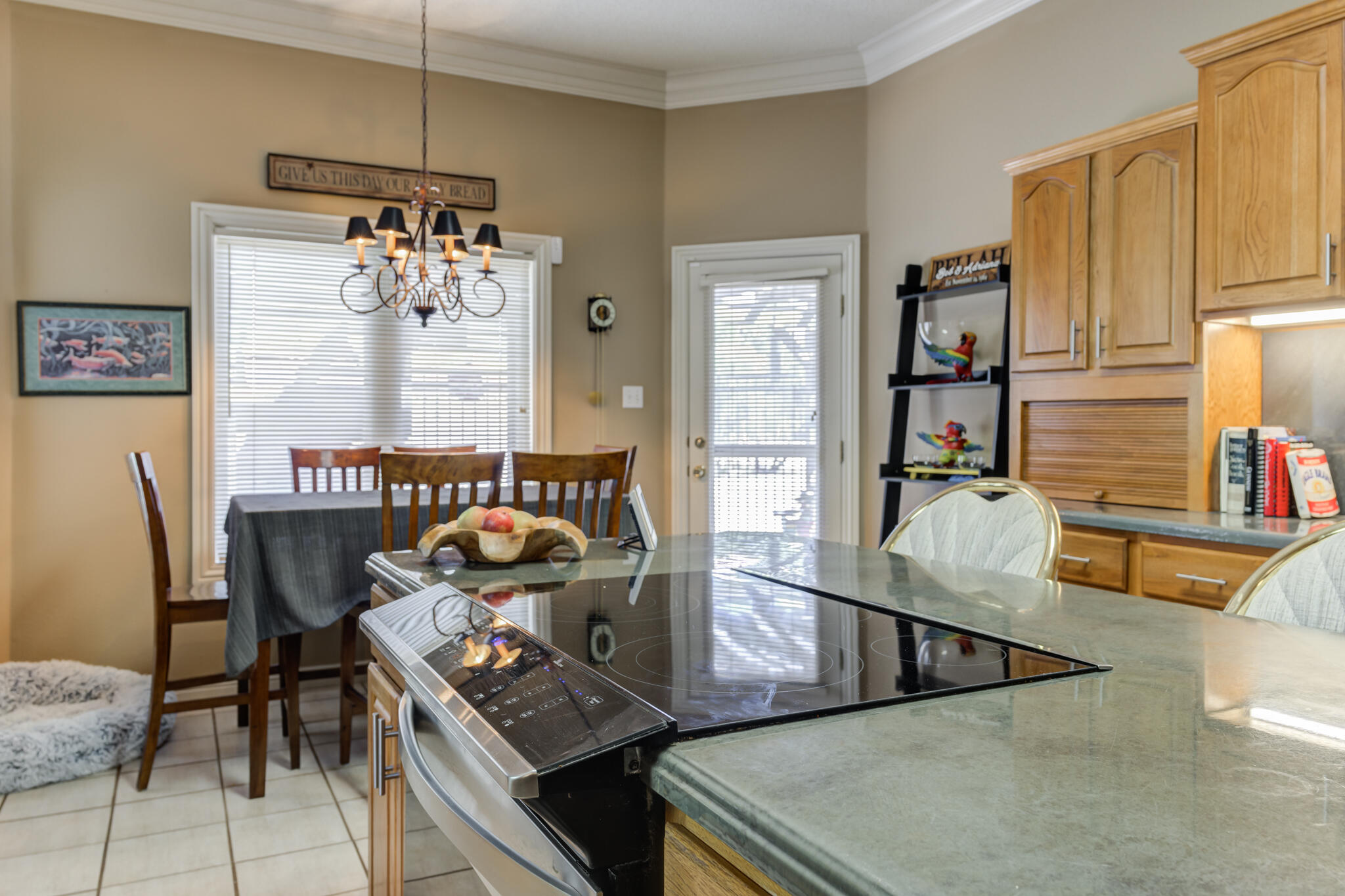 30 West Lakeshore Drive Ransom Canyon, TX 79366 - Photo 18 of 58 a view of a dining room with furniture and chandelier