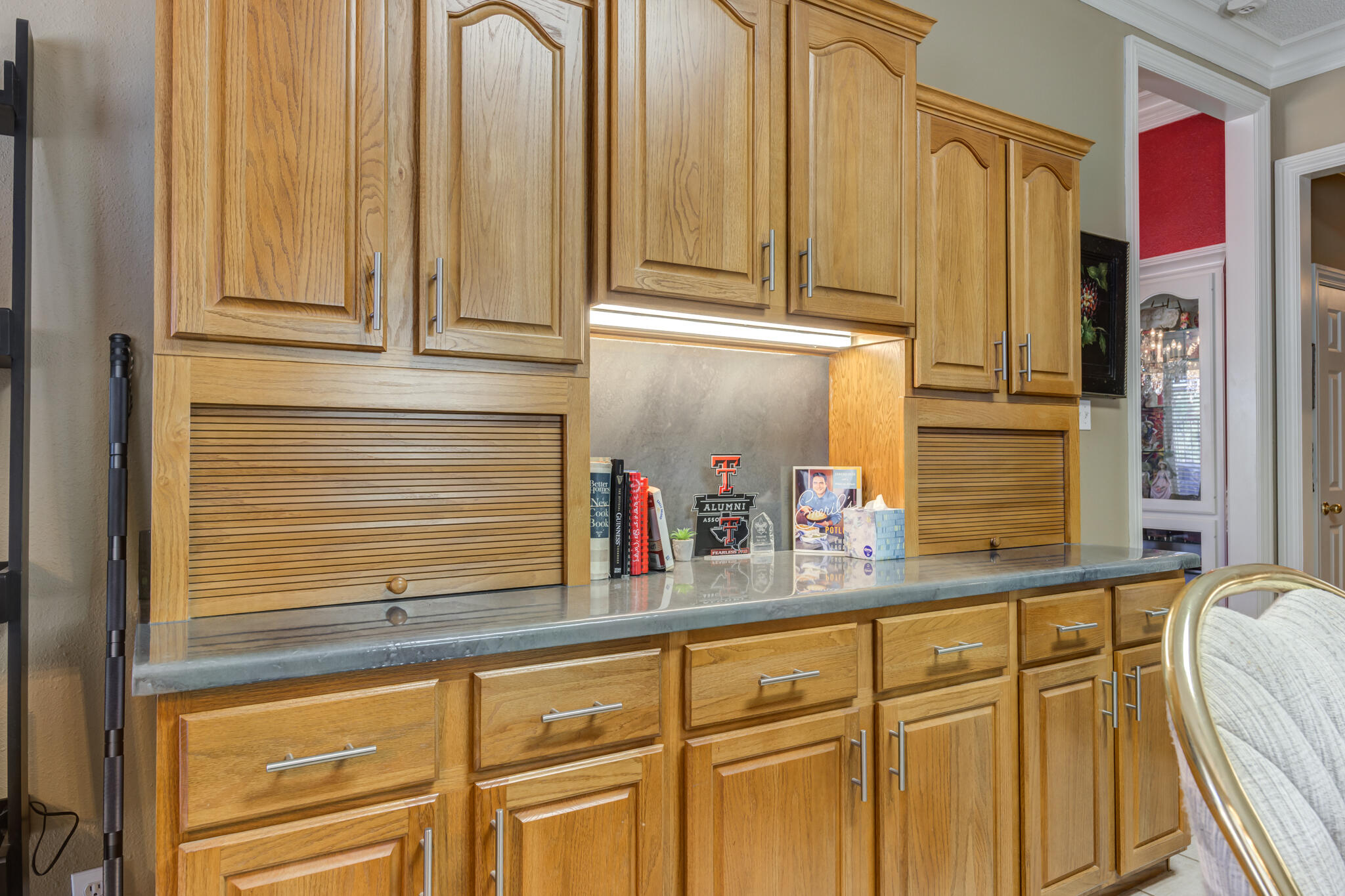 30 West Lakeshore Drive Ransom Canyon, TX 79366 - Photo 21 of 58 a kitchen with stainless steel appliances granite countertop a sink and cabinets